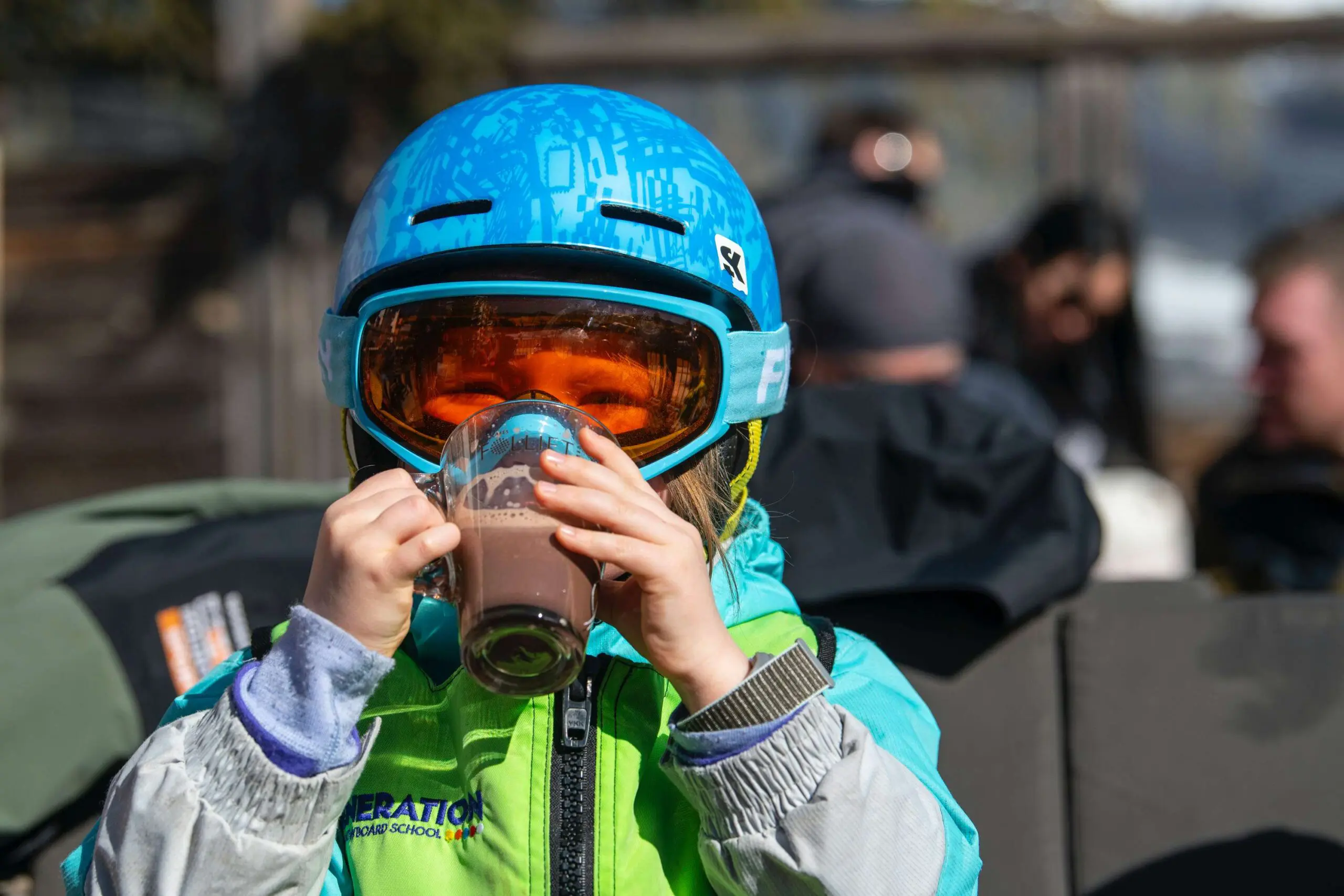 kid drinking hot chocolate