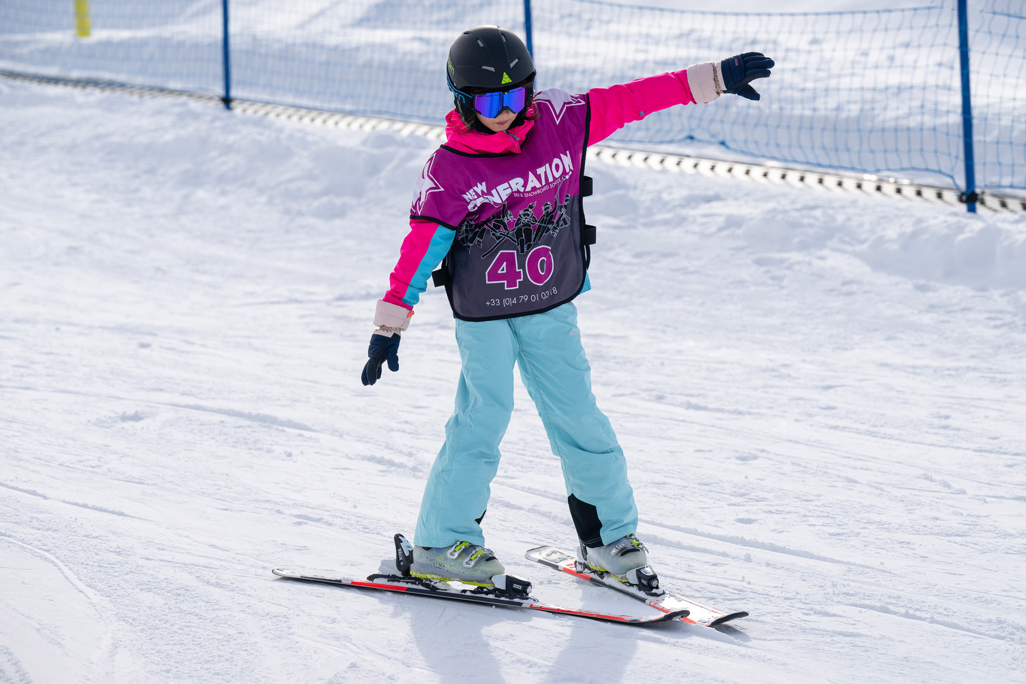 Child doing snowplough