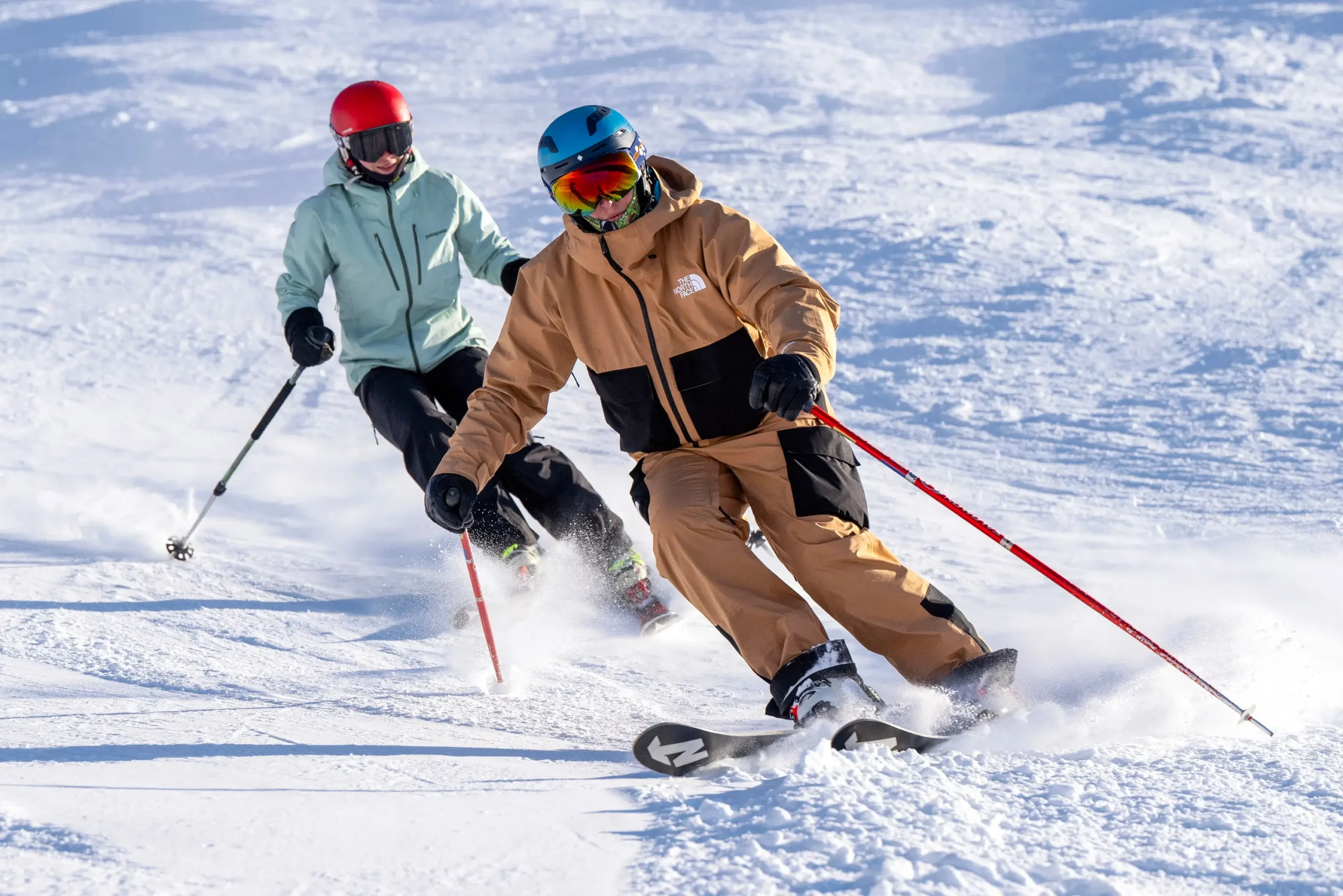 An advanced skier following a ski instructor in Meribel