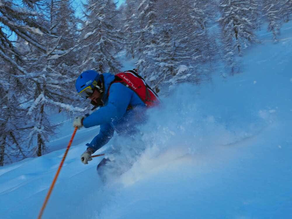 Hugh Jolly Skiing Powder